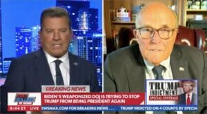 Rudy Giuliani Slams Desk in Angry Rant Against Trump Indictment