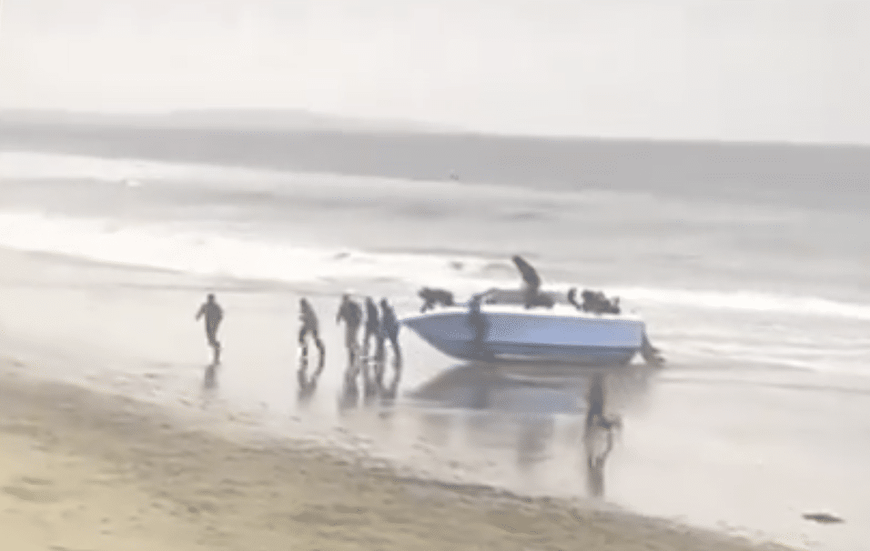 Making Waves: Dozens of Illegal Migrants Drive a Speedboat onto a ...