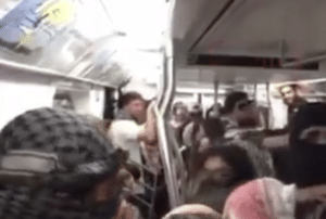 Terror Train: Pro-Palestinian Protesters Flood Subway Car, Tell 'Zionists' 'This is Your Chance to Get Out' [Watch]